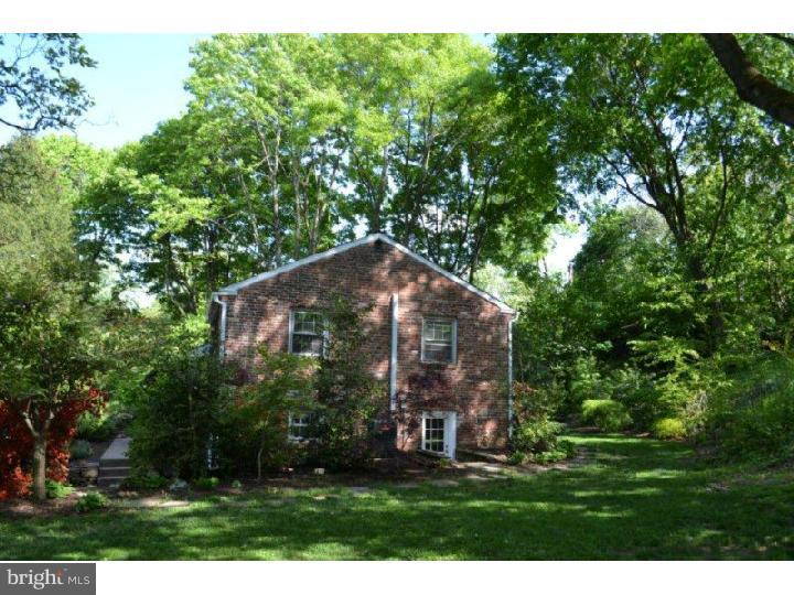 332 Landsende Road Devon, PA 19333 - Photo 3 of 15 a view of a big house with a big yard and large trees