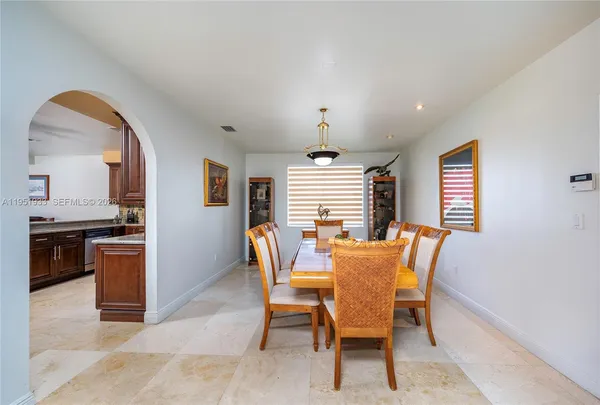 a view of a dining room with furniture