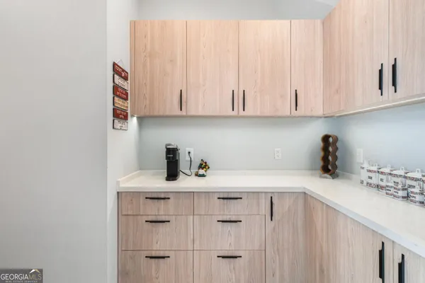 a kitchen with stainless steel appliances granite countertop a stove and a refrigerator