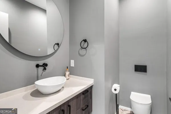 a close view of a utility room with dryer and washer