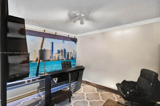 a room with wooden floor and furniture