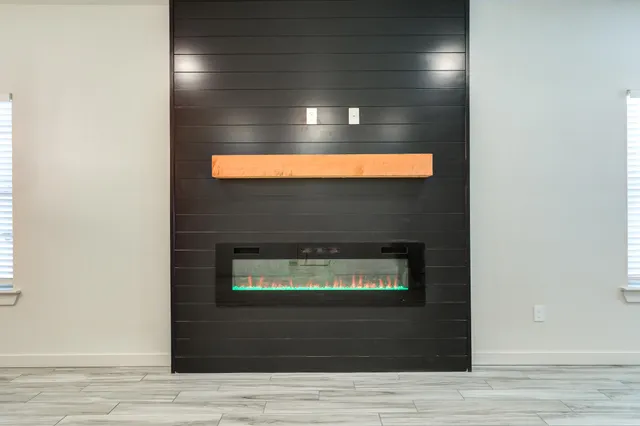 a living room with a fireplace