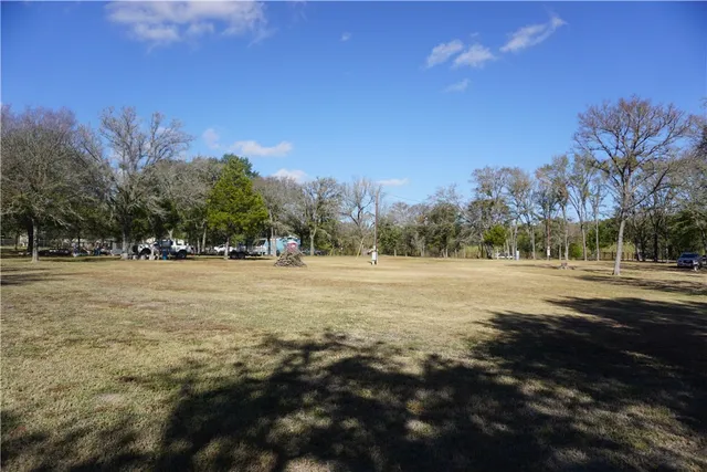 a view of road with trees
