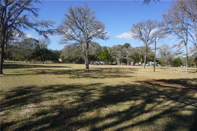 a view of road with trees