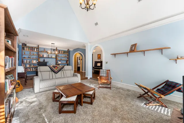 a large kitchen with stainless steel appliances and cabinets