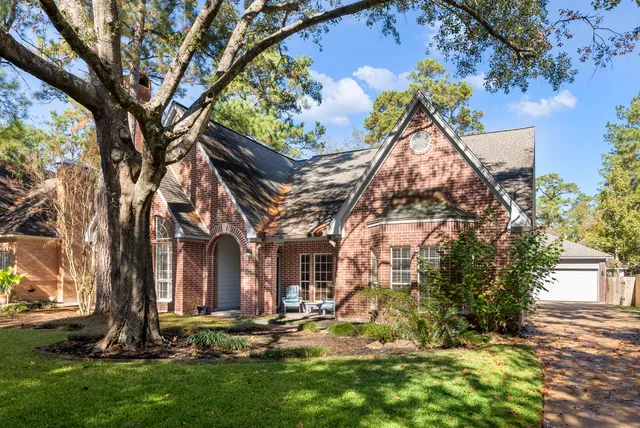 a view of a brick building with many windows