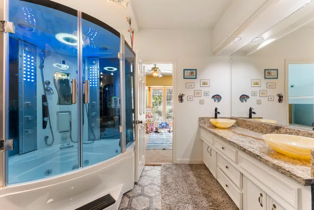 an aerial view of a house with outdoor space