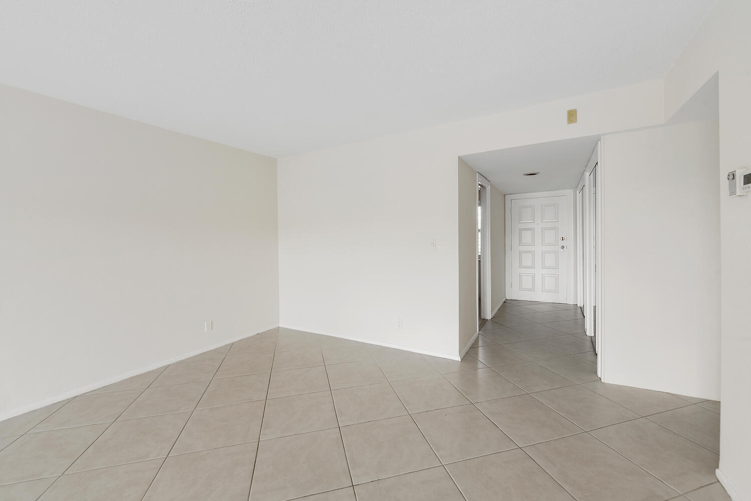 2871 North Ocean Boulevard, Unit F429 Boca Raton, FL 33431 - Photo 9 of 38 an empty room with a natural light