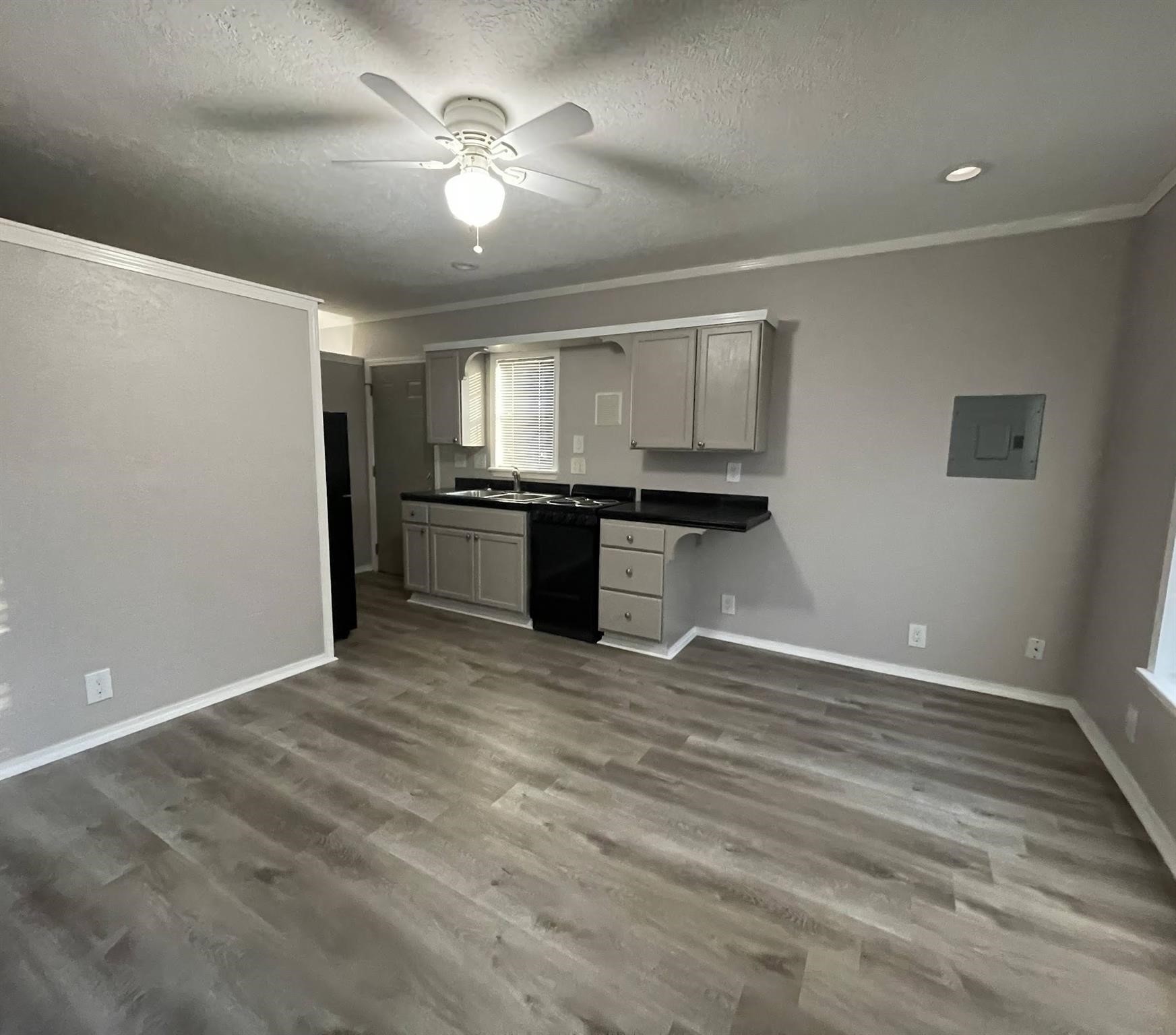 4801 14th Street, Unit A Bacliff, TX 77518 - Photo 3 of 8 Living room and kitchen