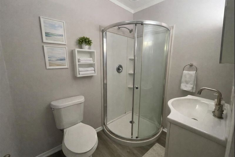 4801 14th Street, Unit A Bacliff, TX 77518 - Photo 7 of 8 Full bathroom with walk-in shower and plenty of space to add some extra storage.