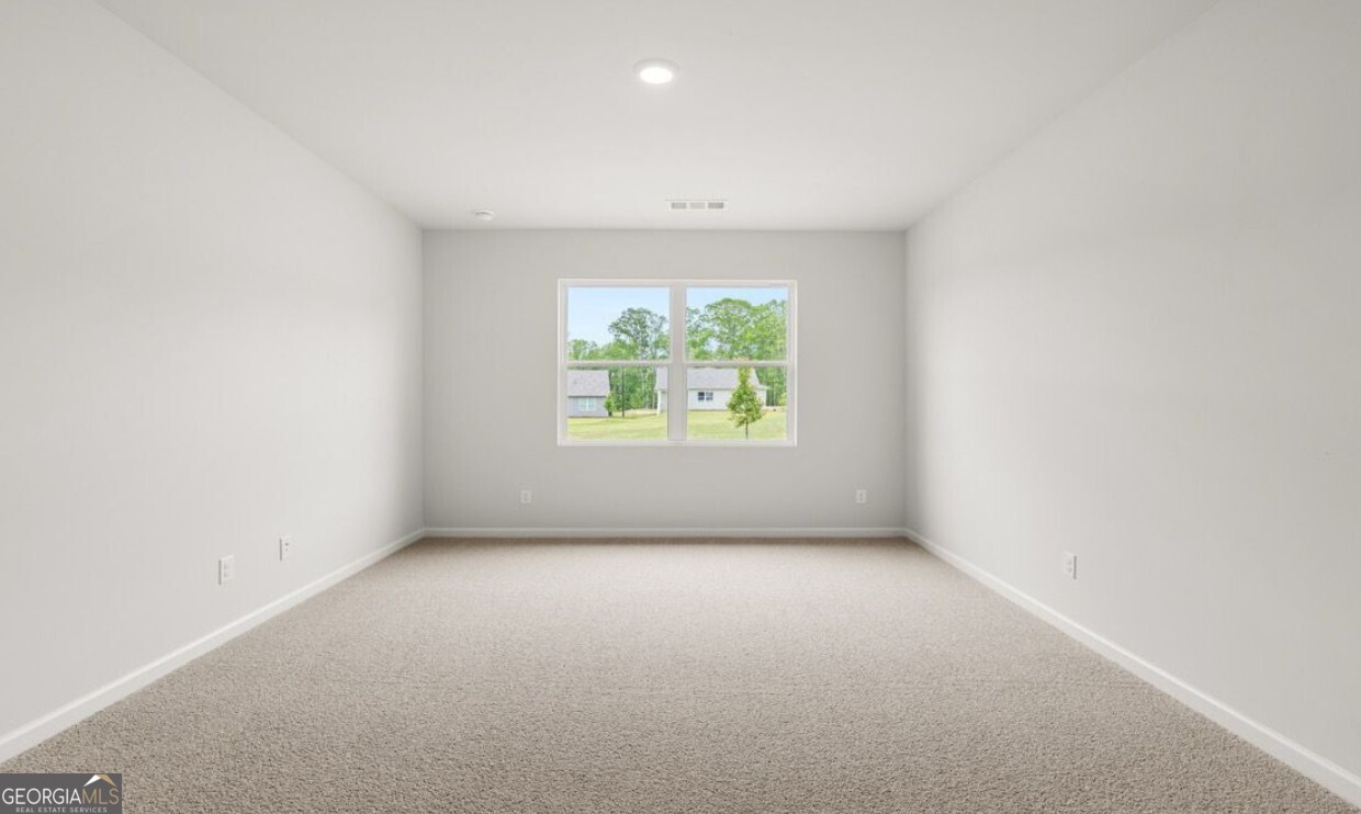 110 Babcock Drive Northeast Rome, GA 30165 - Photo 6 of 12 an empty room with windows