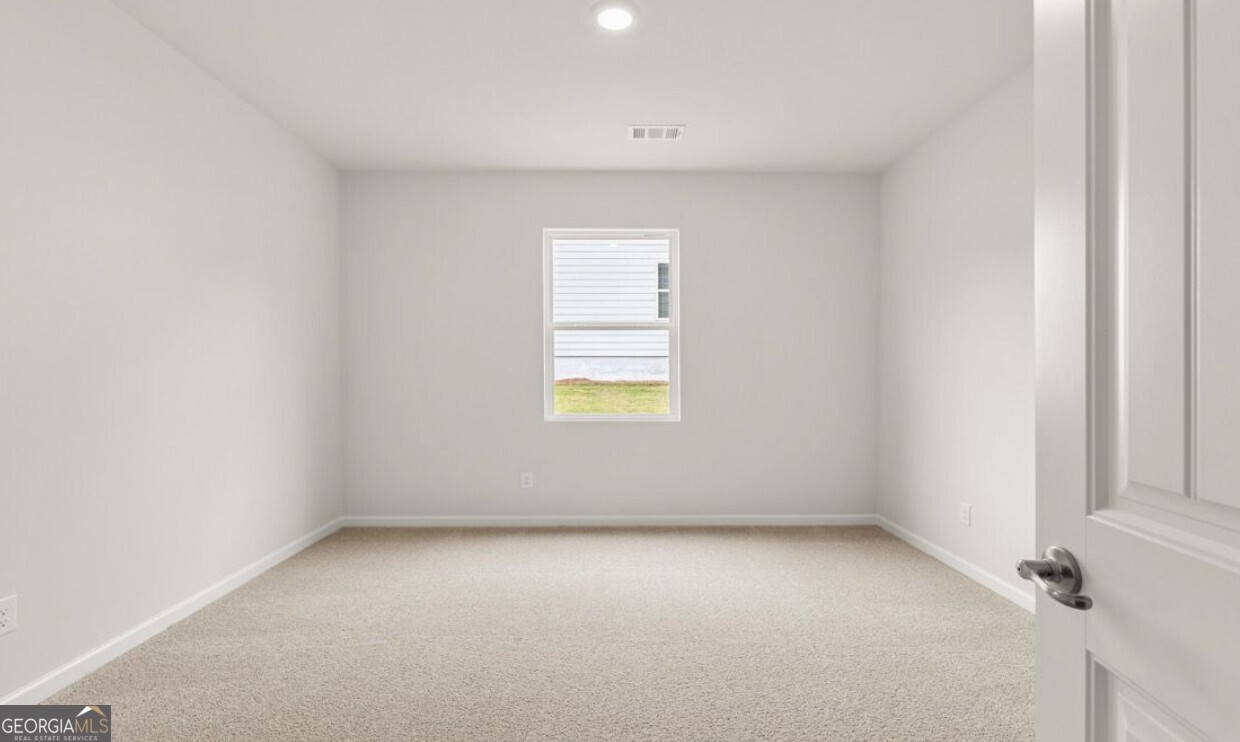 110 Babcock Drive Northeast Rome, GA 30165 - Photo 8 of 12 an empty room with a window