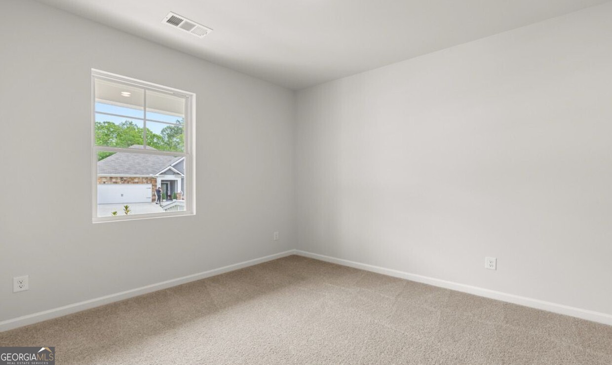 110 Babcock Drive Northeast Rome, GA 30165 - Photo 9 of 12 an empty room with a window