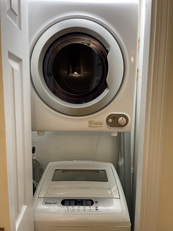 53 Jericho Road, Unit A Weston, MA 02493 - Photo 12 of 16 a utility room with dryer and washer