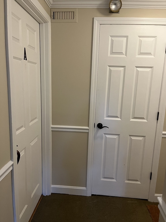 53 Jericho Road, Unit A Weston, MA 02493 - Photo 16 of 16 a view of a livingroom with wooden floor