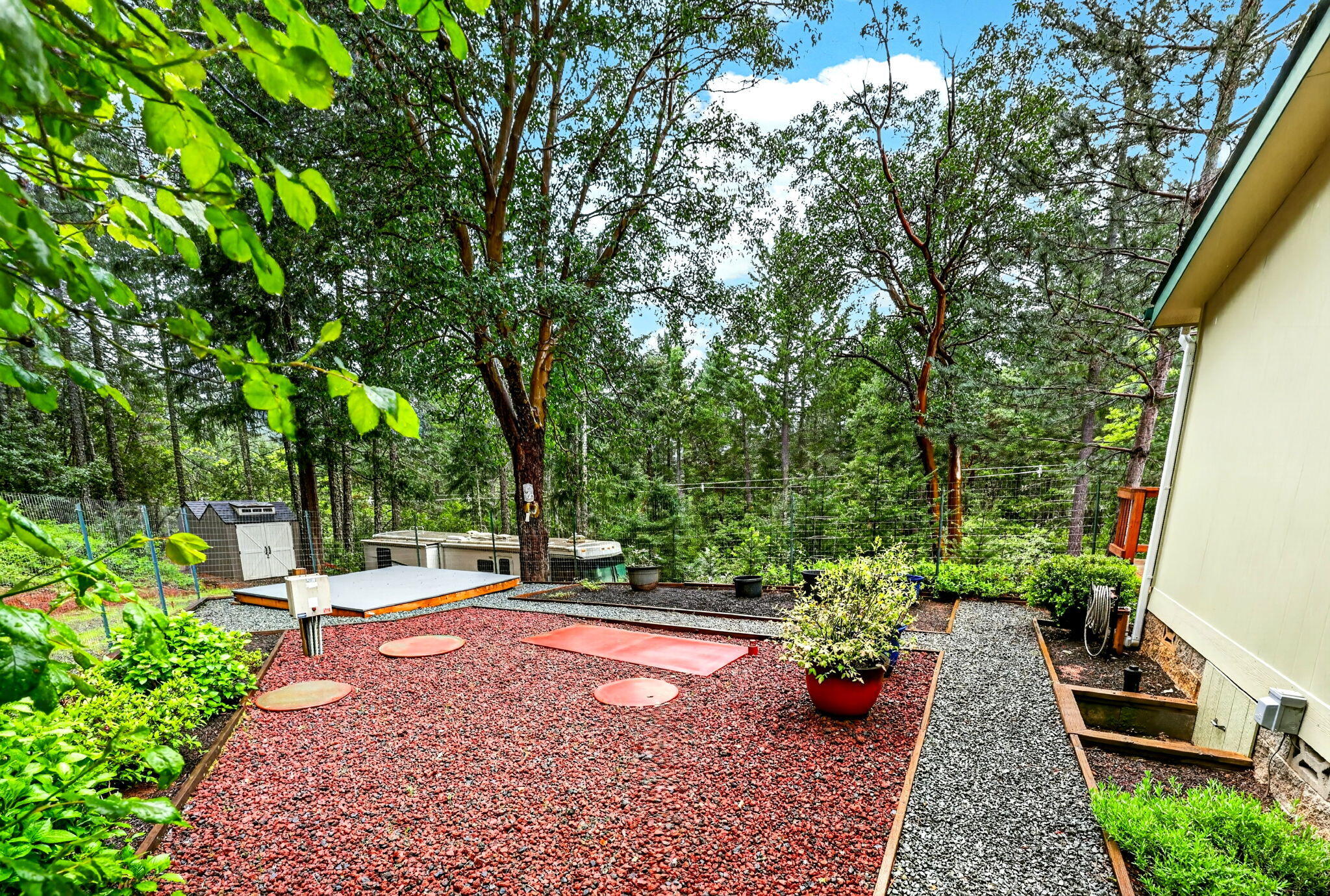5445 Thompson Creek Road Selma, OR 97538 - Photo 49 of 57 a view of a garden with lawn chairs