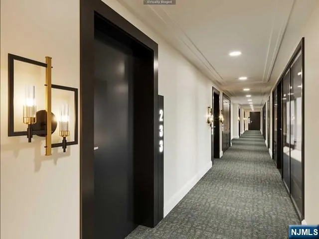 a front view of a house with a street