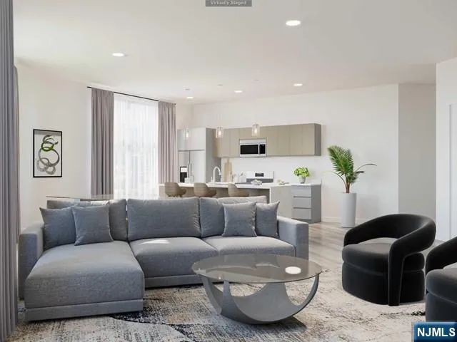 a living room with furniture and a couch