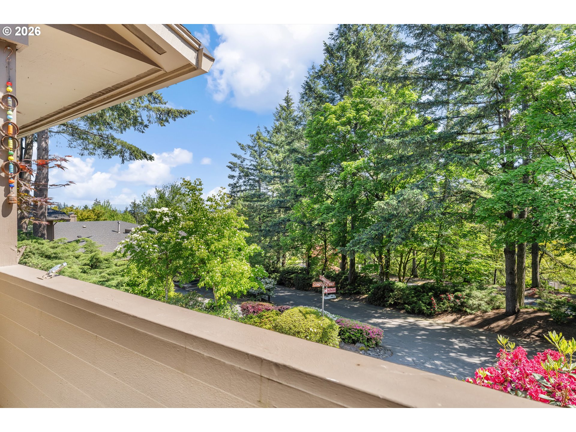 77 Condolea Way Lake Oswego, OR 97035 - Photo 19 of 25 a view of a garden from a window