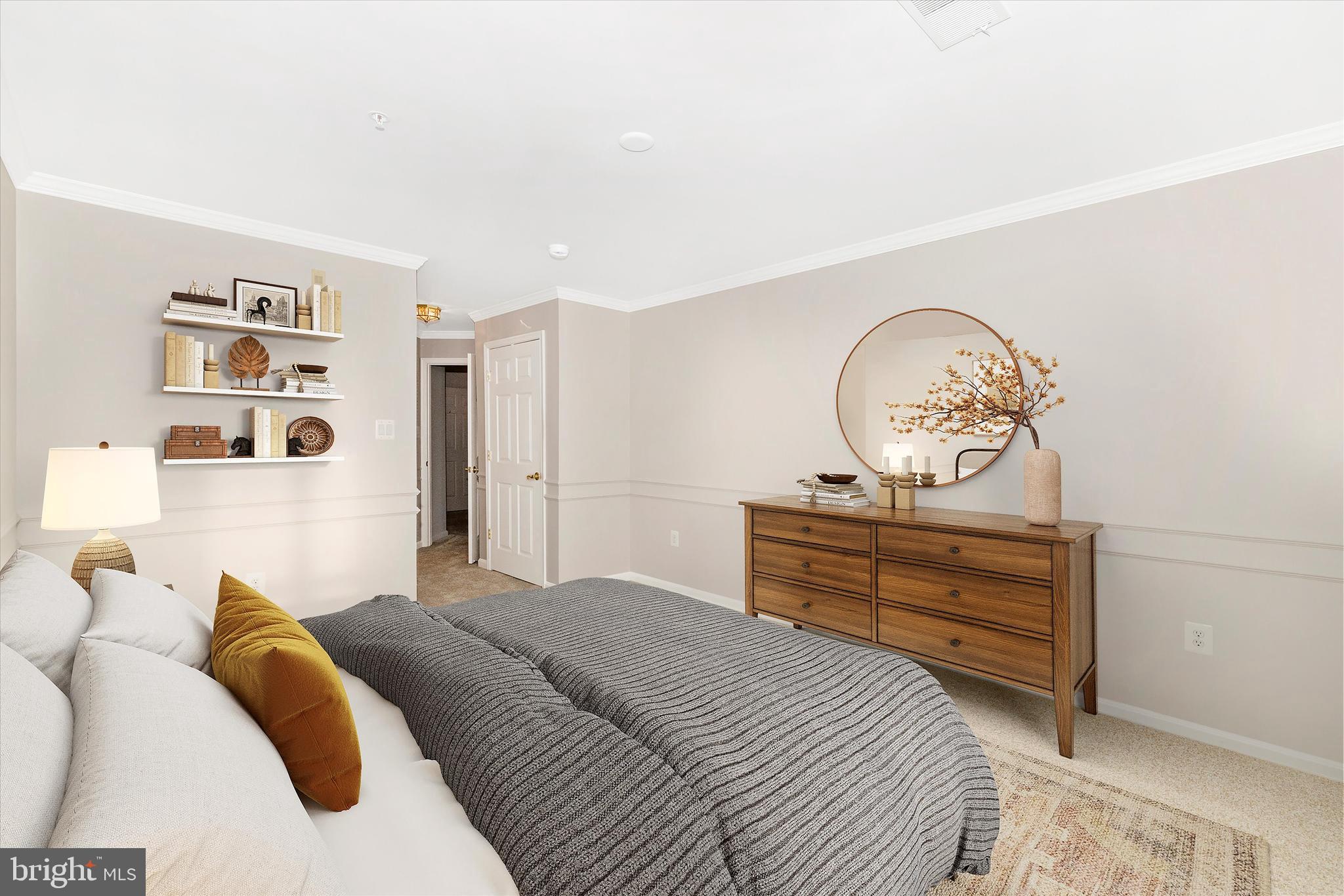 2508 Shelley Circle, Unit 8 1A Frederick, MD 21702 - Photo 14 of 48 a bedroom with a bed and cabinets