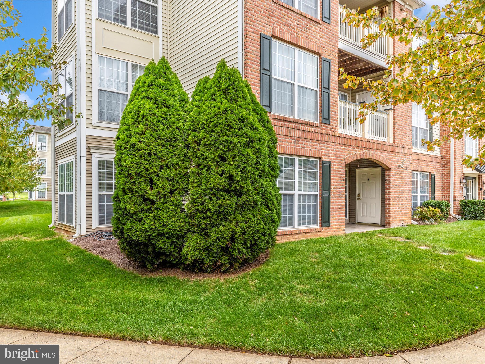 2508 Shelley Circle, Unit 8 1A Frederick, MD 21702 - Photo 32 of 48 front view of a house with a garden
