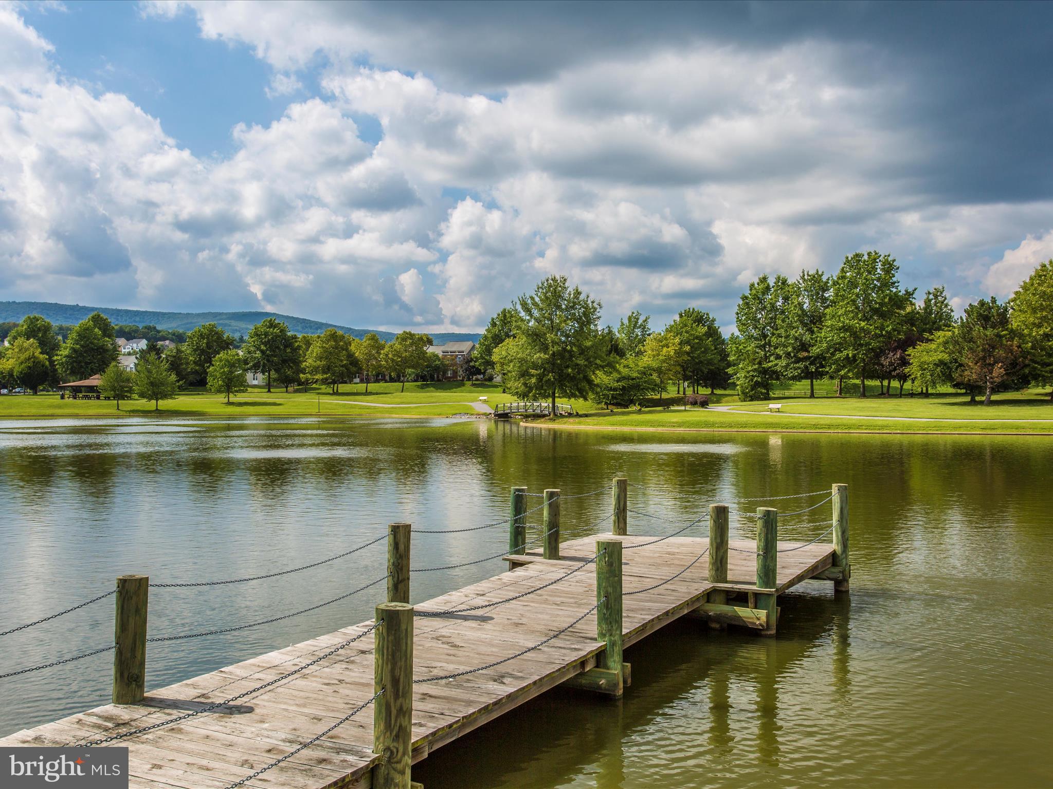 2508 Shelley Circle, Unit 8 1A Frederick, MD 21702 - Photo 34 of 48 a view of a lake with a house
