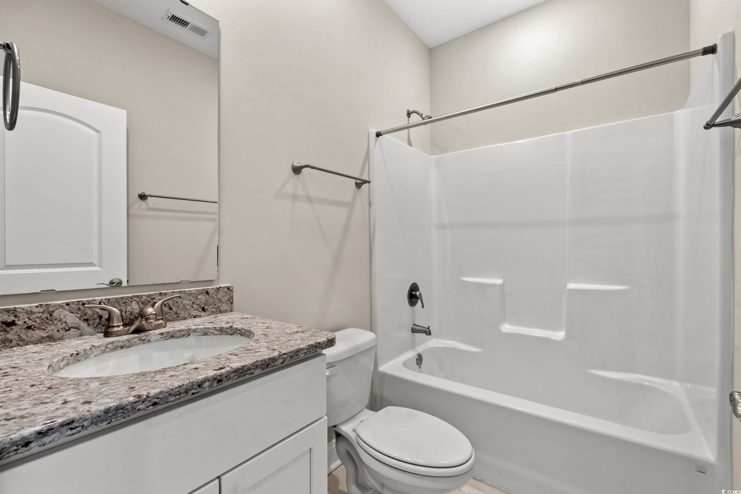 344 Kiskadee Loop, Unit E Conway, SC 29526 - Photo 18 of 36 Full bathroom featuring shower combination, vanit