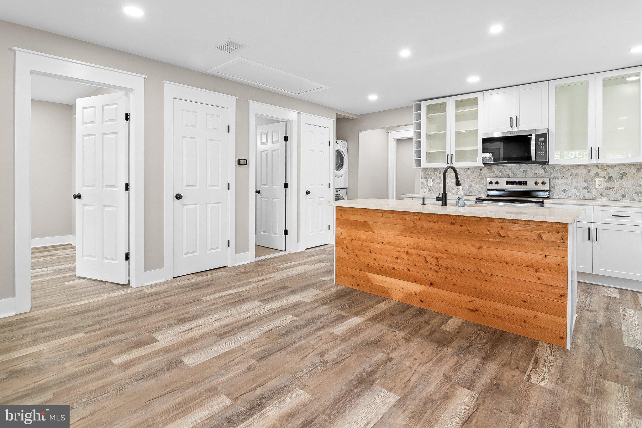 16 Left Wing Drive Middle River, MD 21220 - Photo 5 of 20 Modern kitchen with warm wood accents.