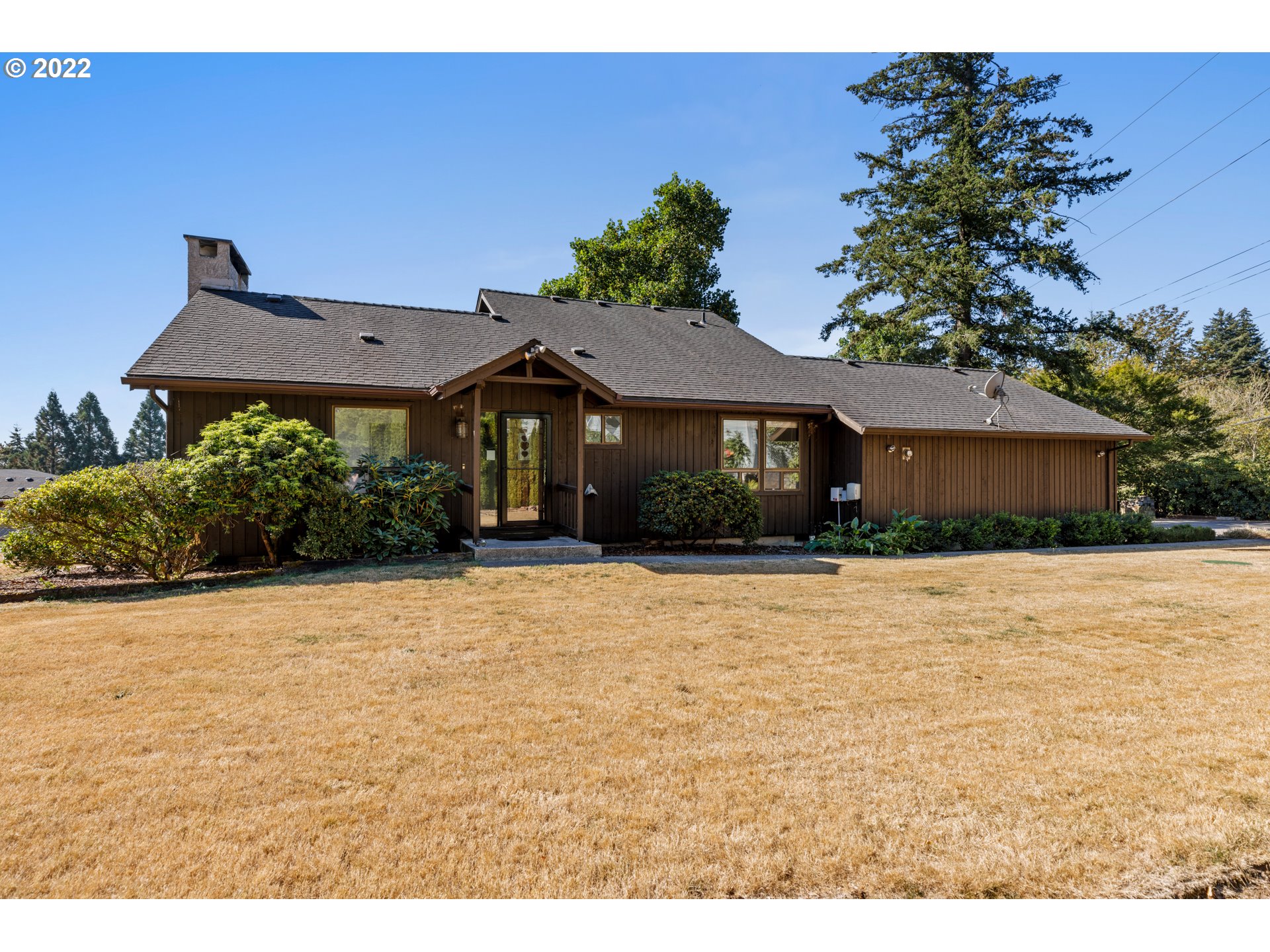 3903 Southeast Stiles Road Washougal, WA 98671 - Photo 1 of 28 a front view of a house with a yard