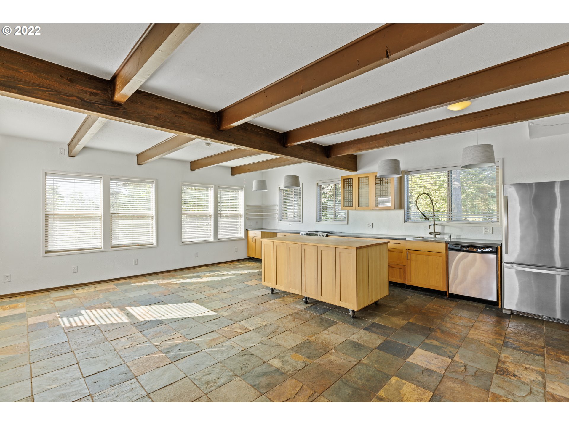 3903 Southeast Stiles Road Washougal, WA 98671 - Photo 11 of 28 a large white kitchen with a large window