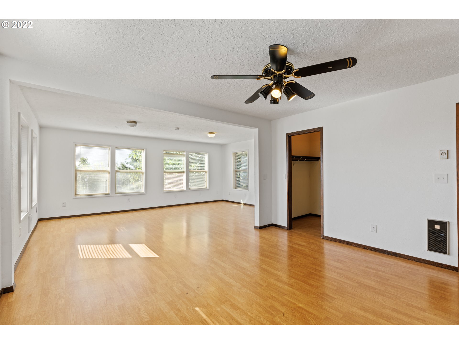 3903 Southeast Stiles Road Washougal, WA 98671 - Photo 17 of 28 a view of an empty room with window and wooden floor