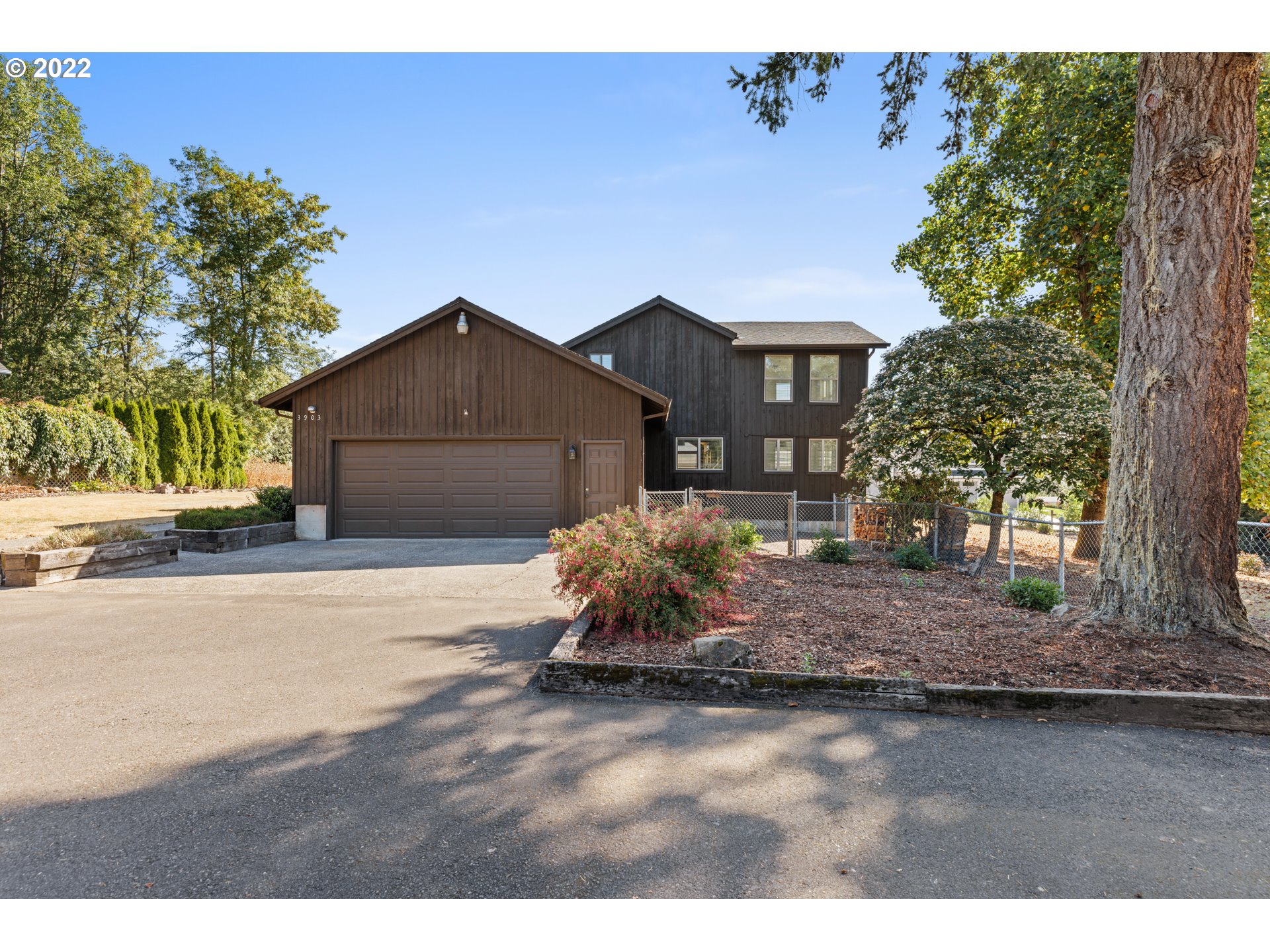 3903 Southeast Stiles Road Washougal, WA 98671 - Photo 3 of 28 a front view of a house with a yard