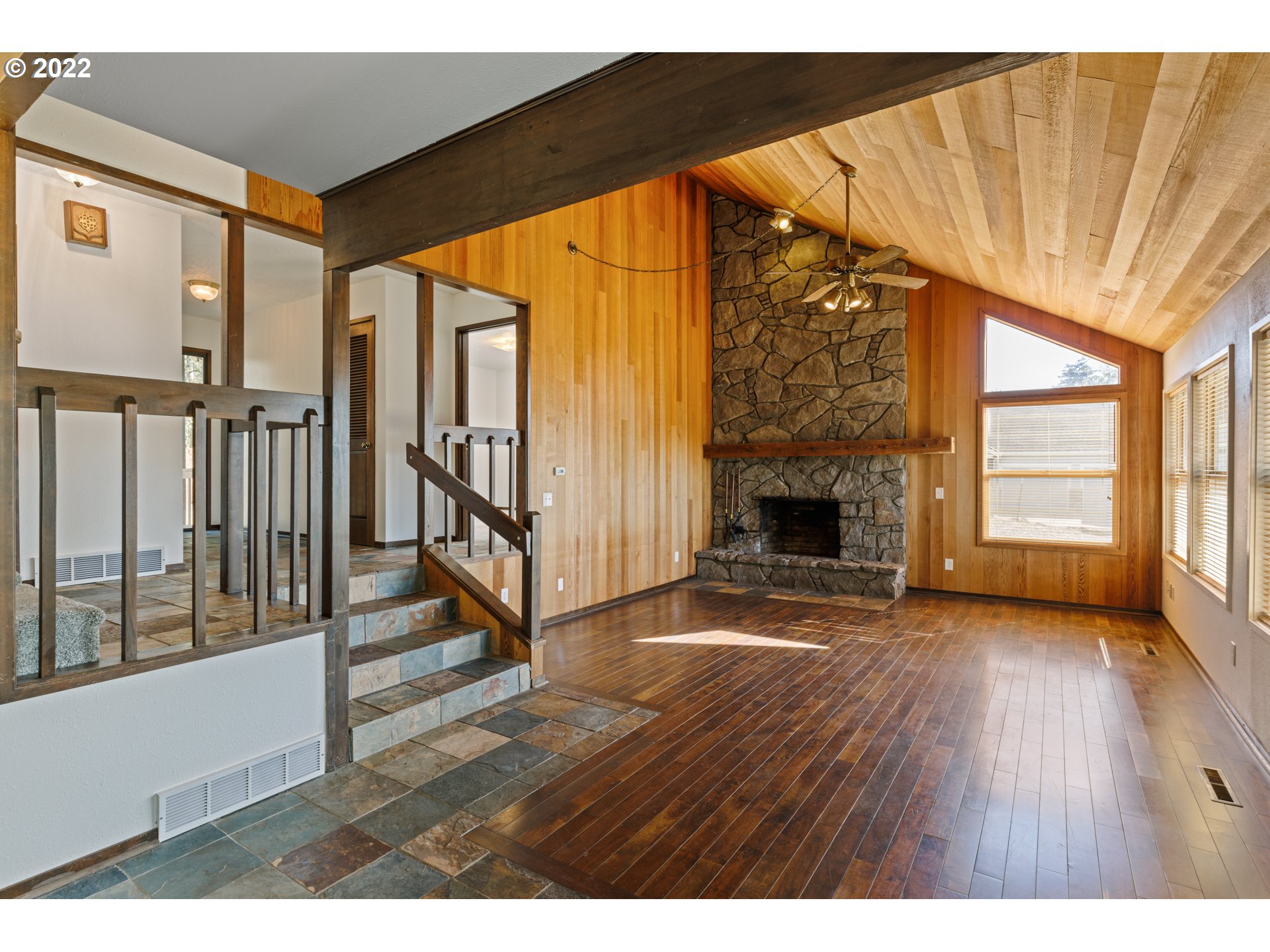 3903 Southeast Stiles Road Washougal, WA 98671 - Photo 4 of 28 a view of an empty room with wooden floor and a window