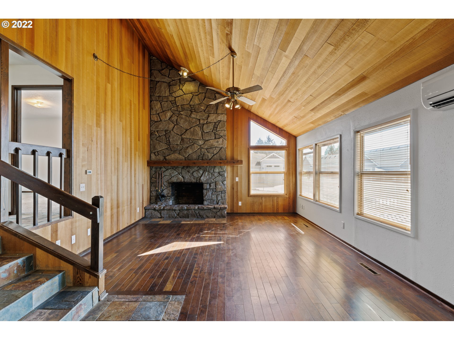 3903 Southeast Stiles Road Washougal, WA 98671 - Photo 5 of 28 a view of an empty room with window and wooden floor