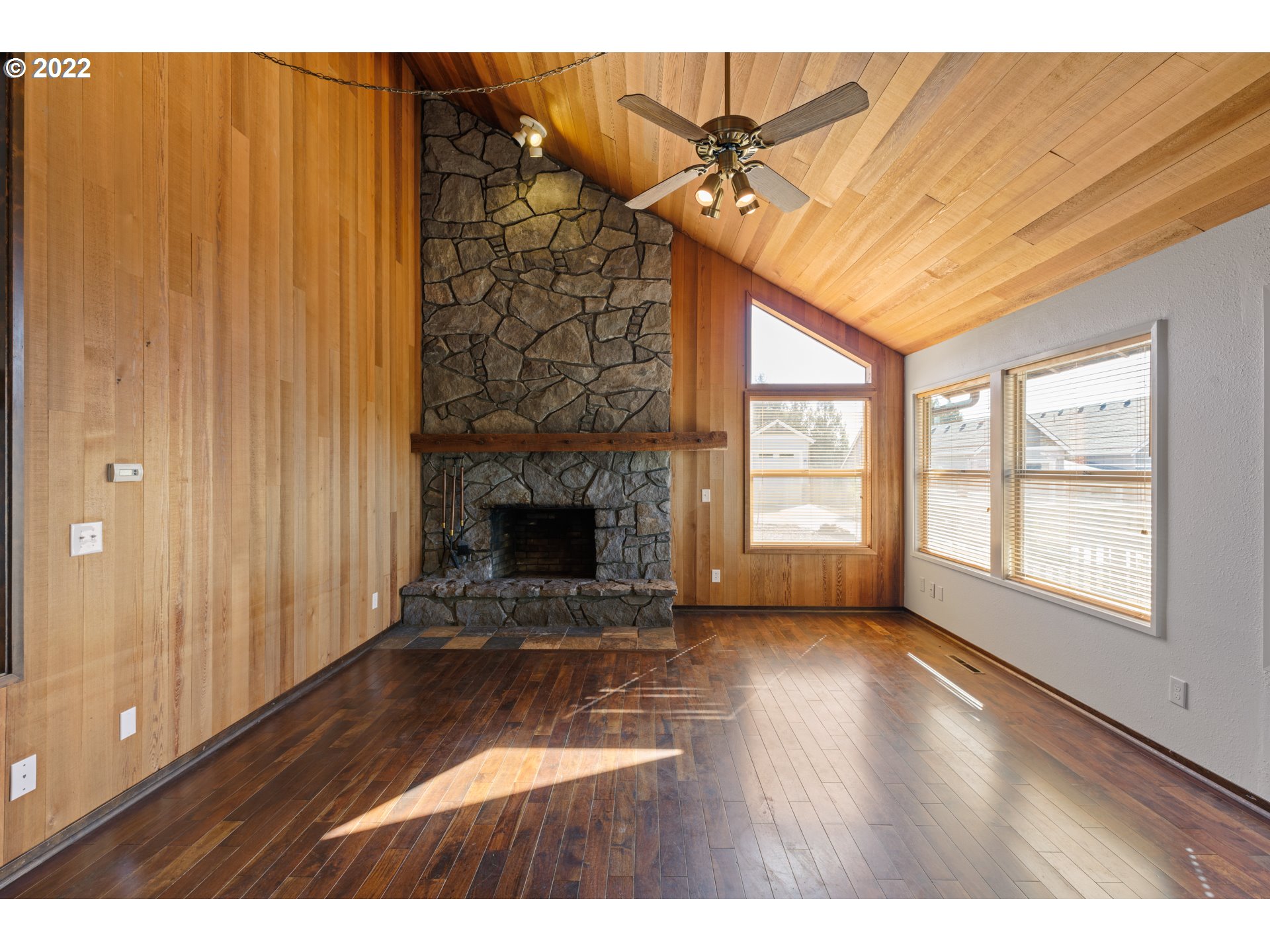 3903 Southeast Stiles Road Washougal, WA 98671 - Photo 6 of 28 a view of a livingroom with a fireplace and window