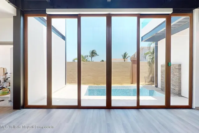 a view of an empty room and window