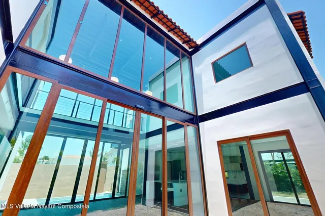 a view of porch with a potted plant