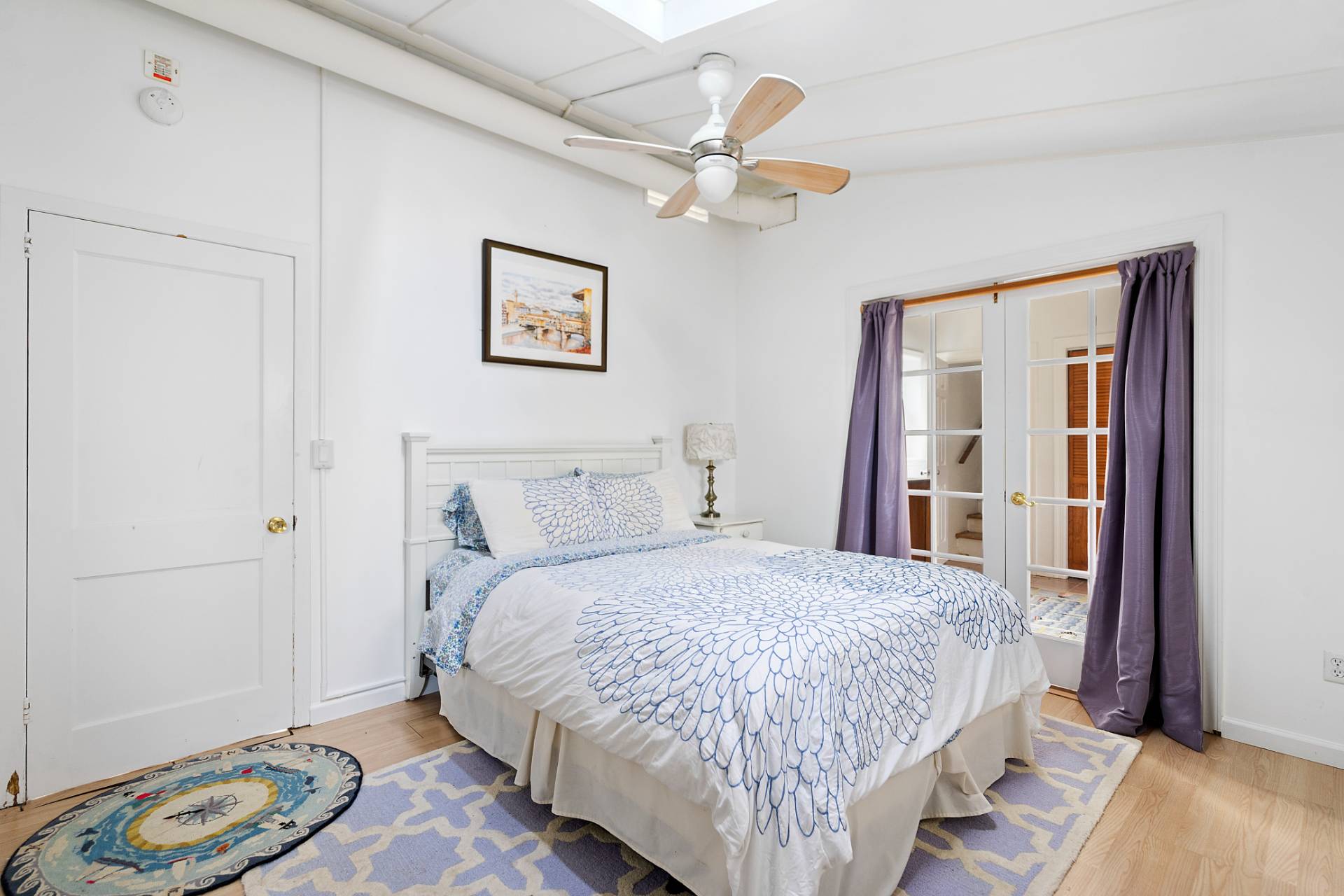 5 South Dorset Drive Montauk, NY 11954 - Photo 16 of 20 a bedroom with a bed and a window