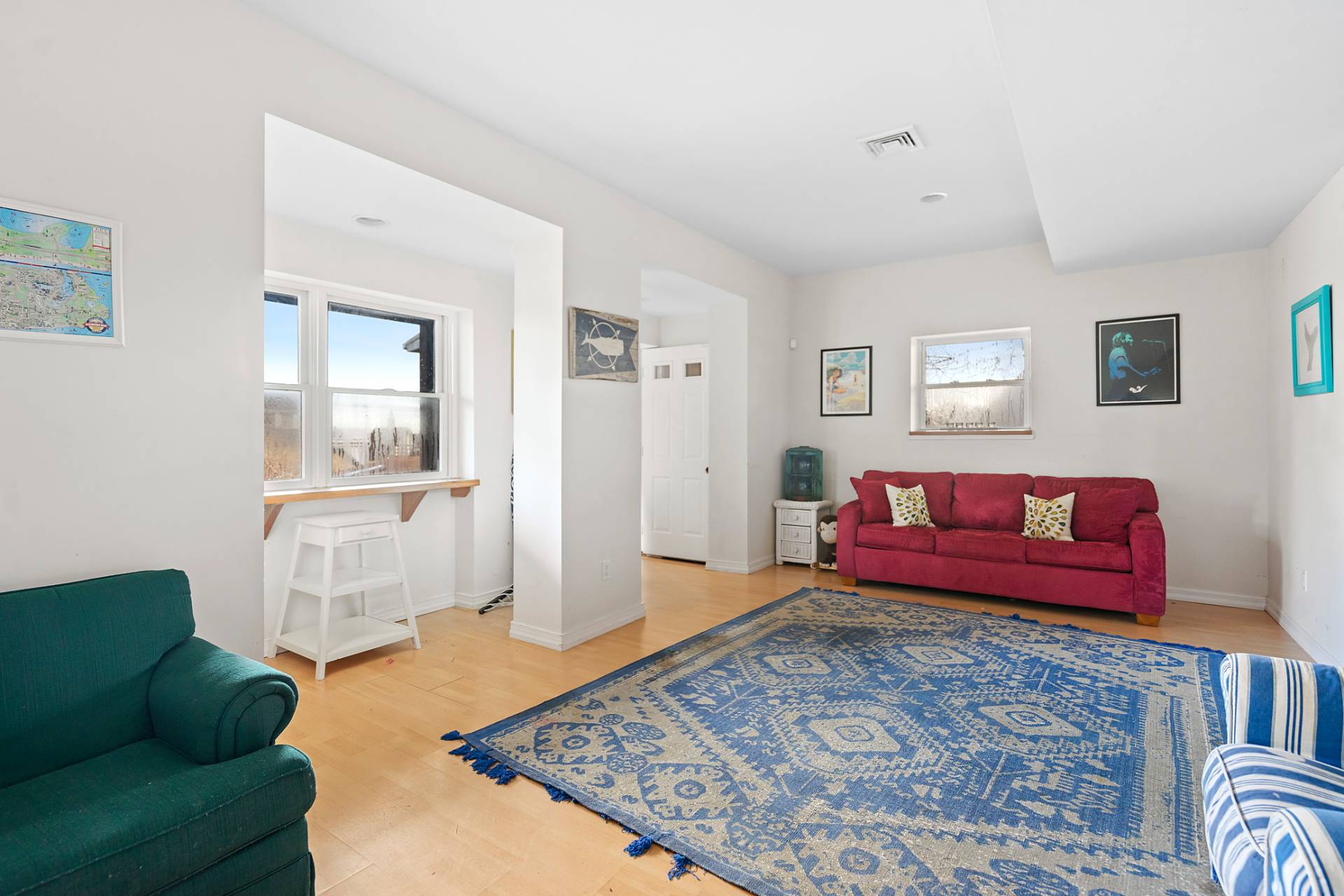 5 South Dorset Drive Montauk, NY 11954 - Photo 9 of 20 a living room with furniture and a rug