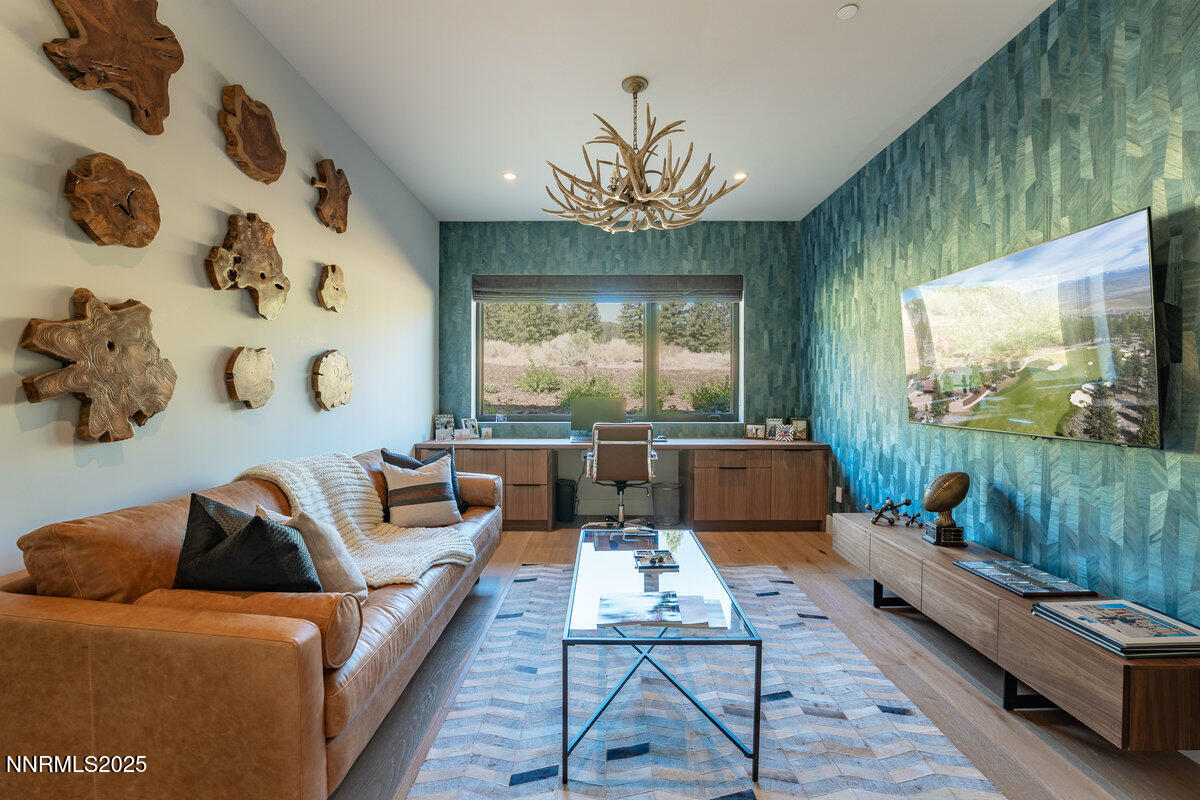 181 Redding Way Carson City, NV 89705 - Photo 29 of 40 a living room with furniture and a flat screen tv