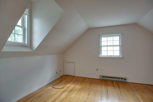 984 Ridge Road Bridgewater, VA 22812 - Photo 14 of 29 an empty room with wooden floor and windows