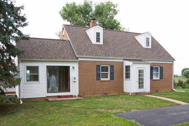 984 Ridge Road Bridgewater, VA 22812 - Photo 15 of 29 a front view of a house with a yard