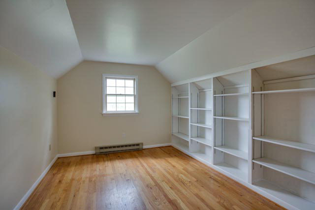 984 Ridge Road Bridgewater, VA 22812 - Photo 9 of 29 an empty room with wooden floor and window
