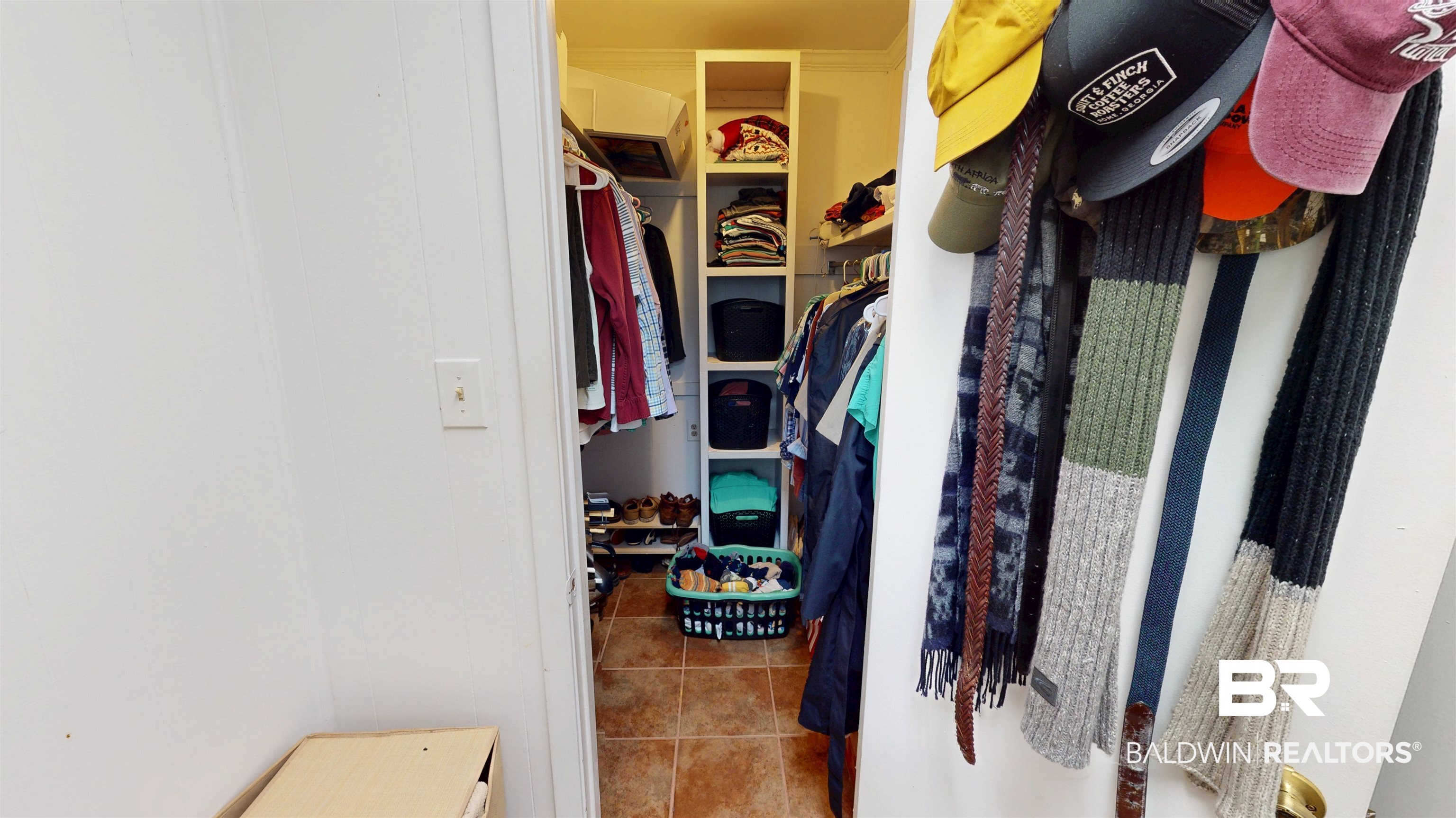 266 Westwood Street Mobile, AL 36606 - Photo 23 of 34 Spacious closet with tile patterned floors