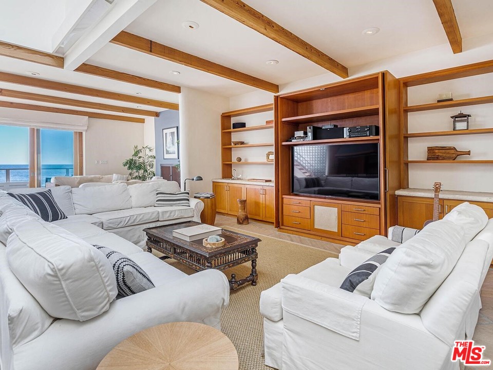 31376 Broad Beach Road Malibu, CA 90265 - Photo 12 of 26 a living room with furniture and a flat screen tv