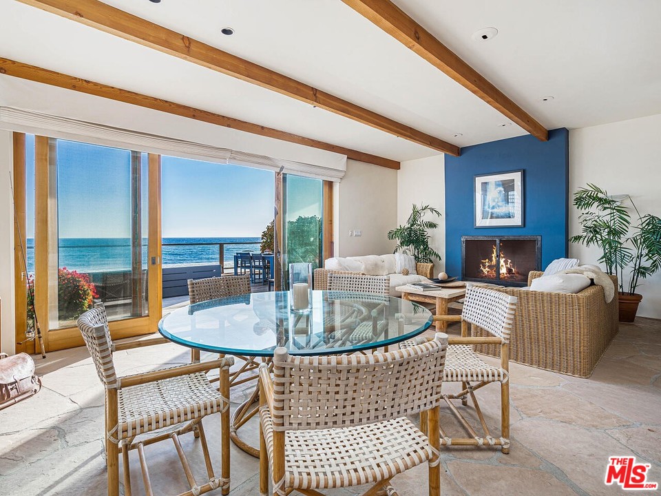 31376 Broad Beach Road Malibu, CA 90265 - Photo 13 of 26 a living room with furniture and a fireplace