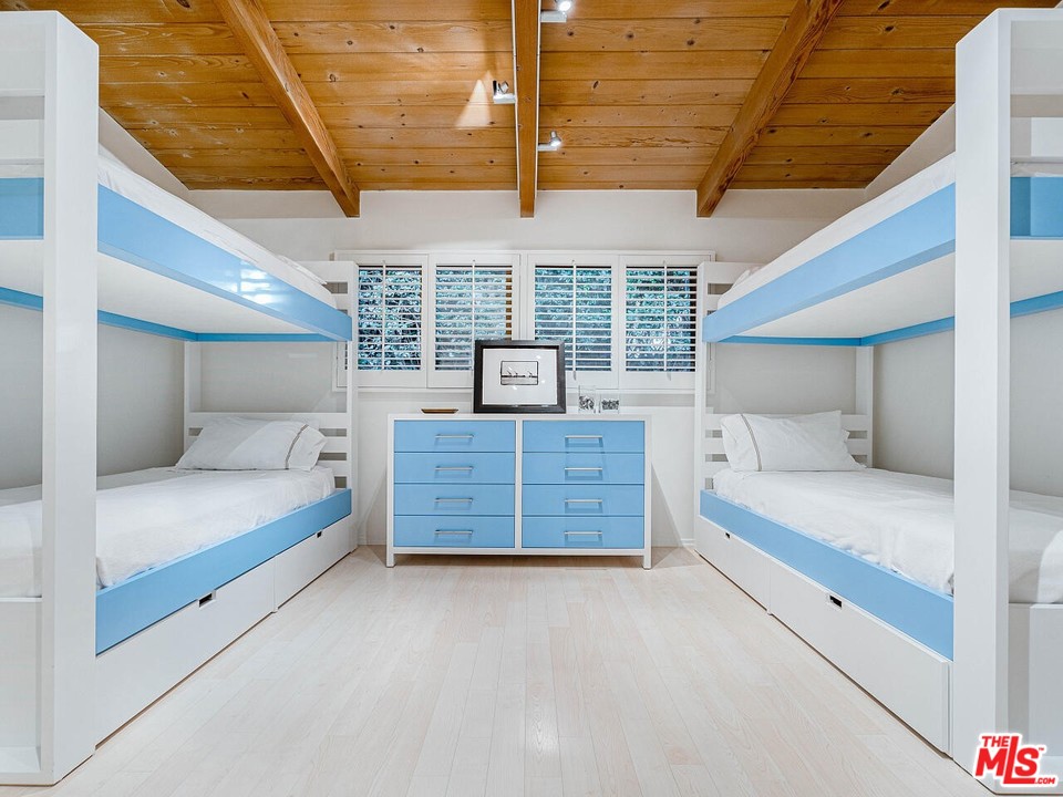 31376 Broad Beach Road Malibu, CA 90265 - Photo 17 of 26 a bedroom with furniture and window