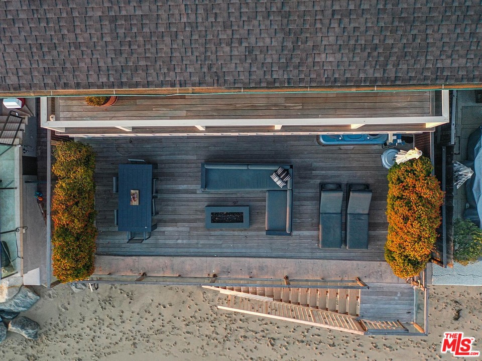 31376 Broad Beach Road Malibu, CA 90265 - Photo 21 of 26 a view of a fireplace with a wooden floor
