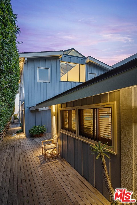 31376 Broad Beach Road Malibu, CA 90265 - Photo 24 of 26 a house view with a seating space and wooden floor