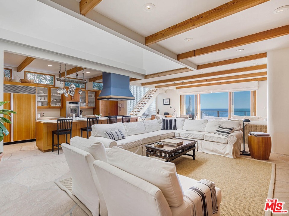 31376 Broad Beach Road Malibu, CA 90265 - Photo 10 of 26 a bedroom with furniture and a large window